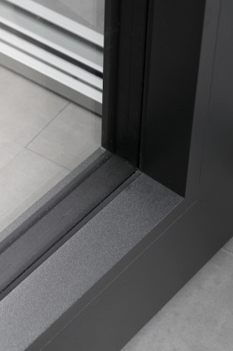 Baie vitrée à galandage isolation warm edge